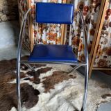 Set of 6 blue chairs with design curves