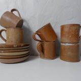 6 stoneware cups and saucers