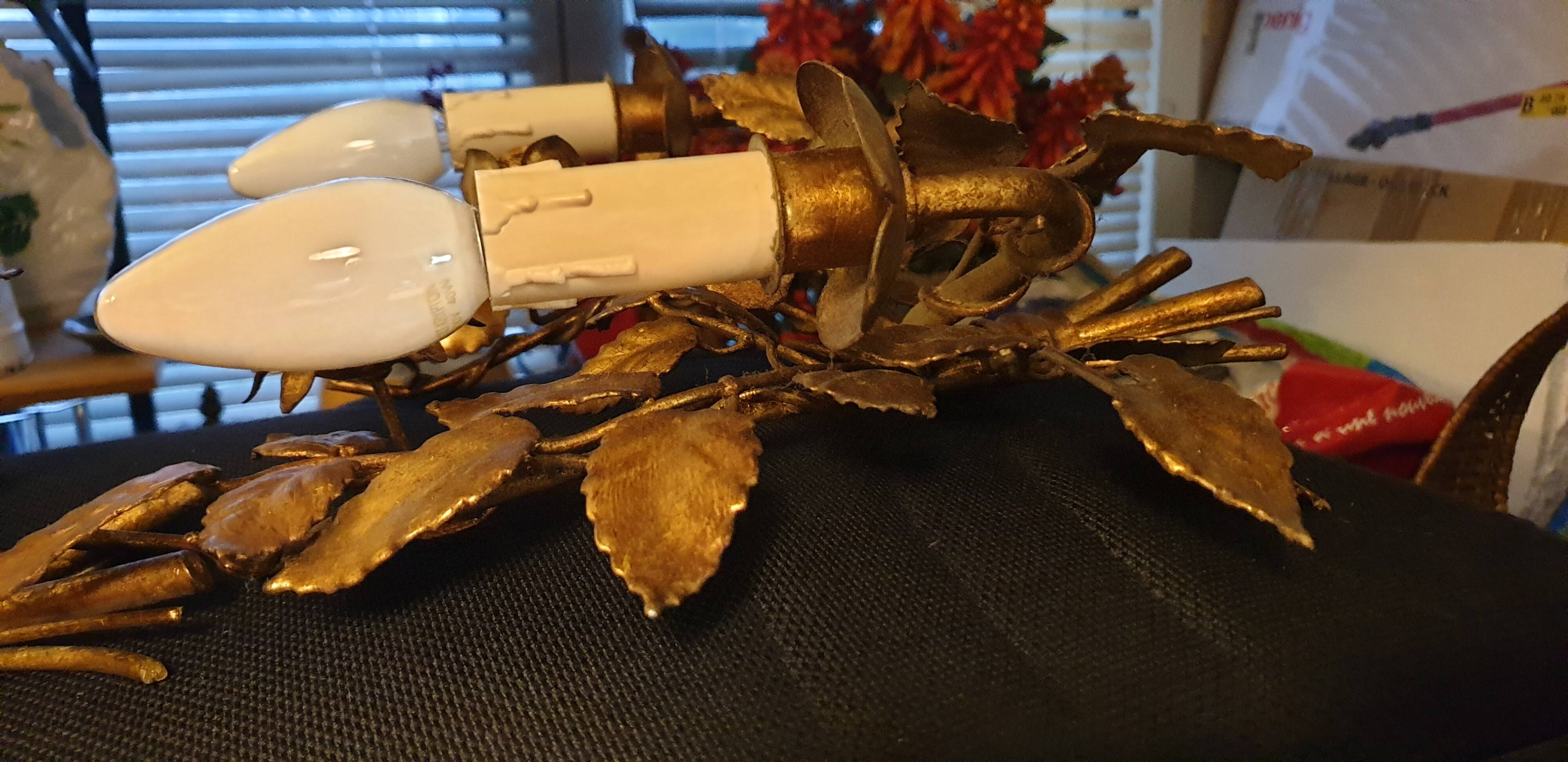 Pair of gold metal wall lights