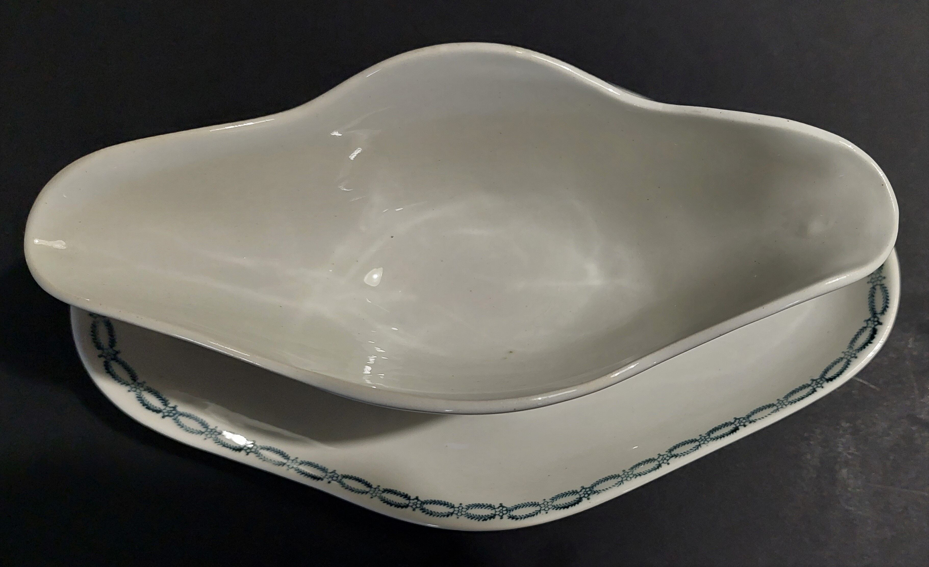 Faience sauce boat from Saint Amand