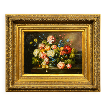 Still life with roses in a beautiful frame on a wooden panel in Flemish style.