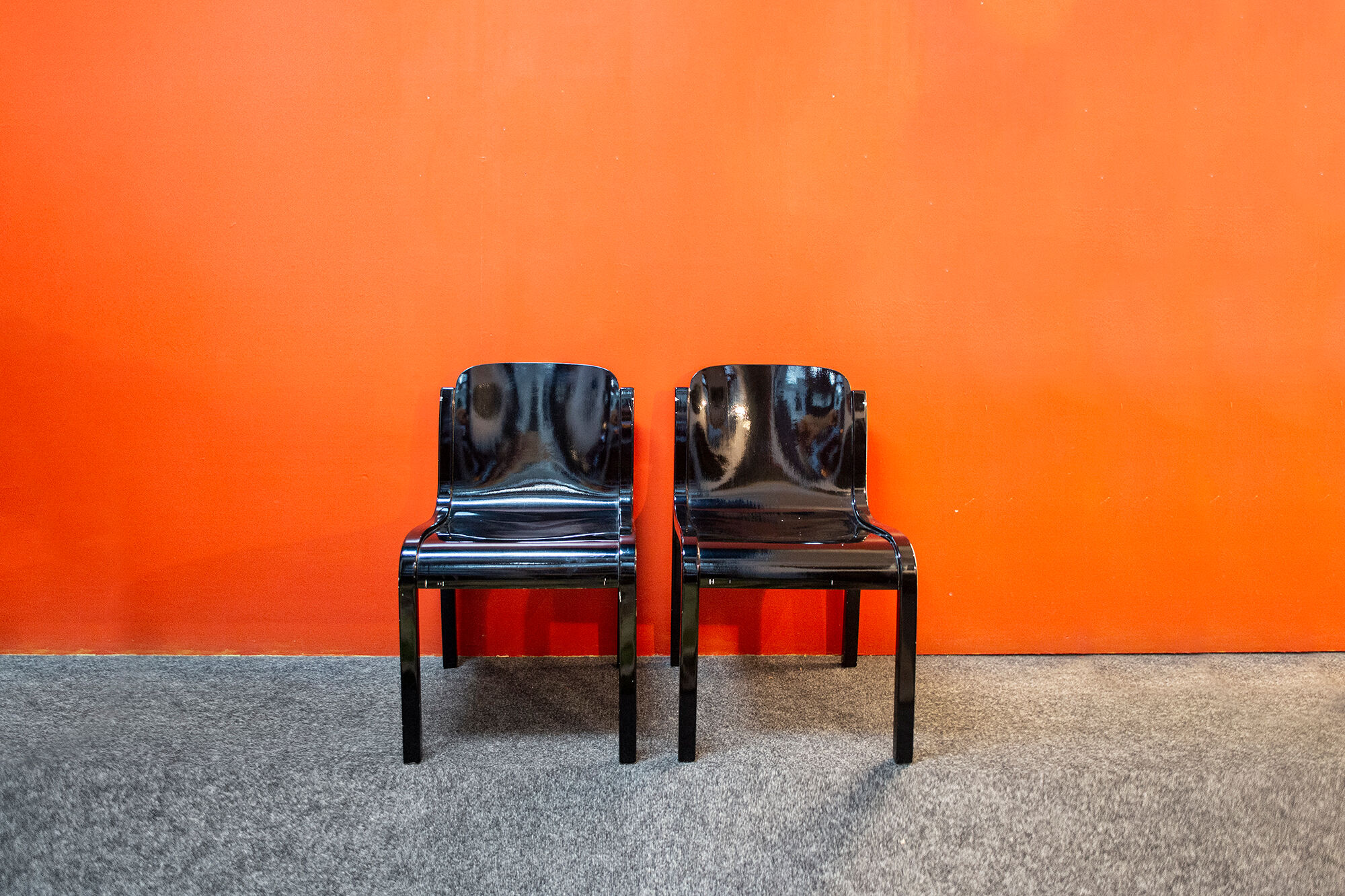 Pair of chairs in black lacquered wood Italy 70s