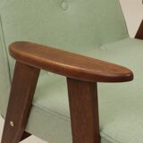 Mid-century modern armchair, oak wood, natural wool.
