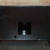 Contemporary Chinese buffet with a marble top and space for a mini-fridge.