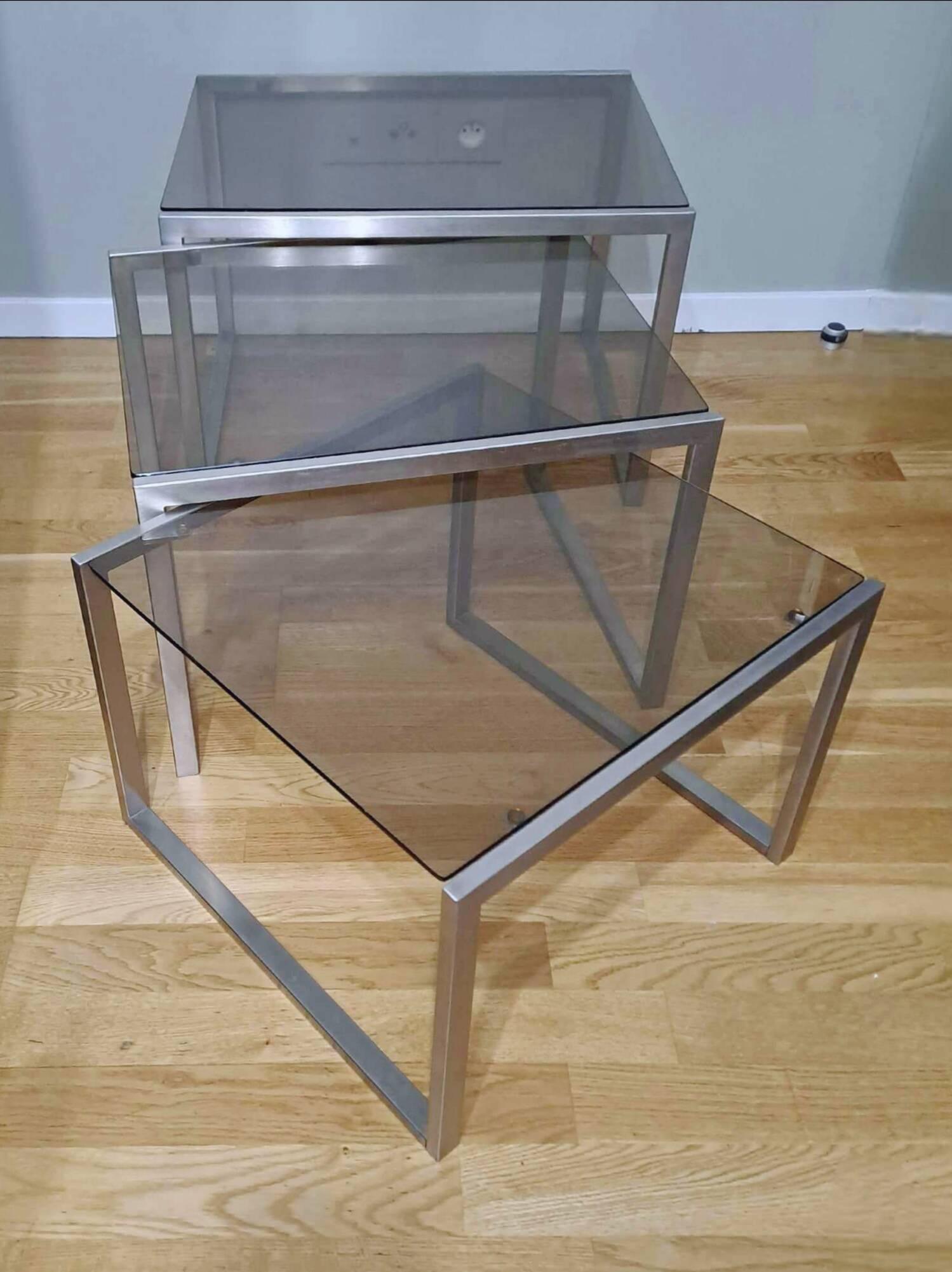 Chrome and smoked glass designer nesting table