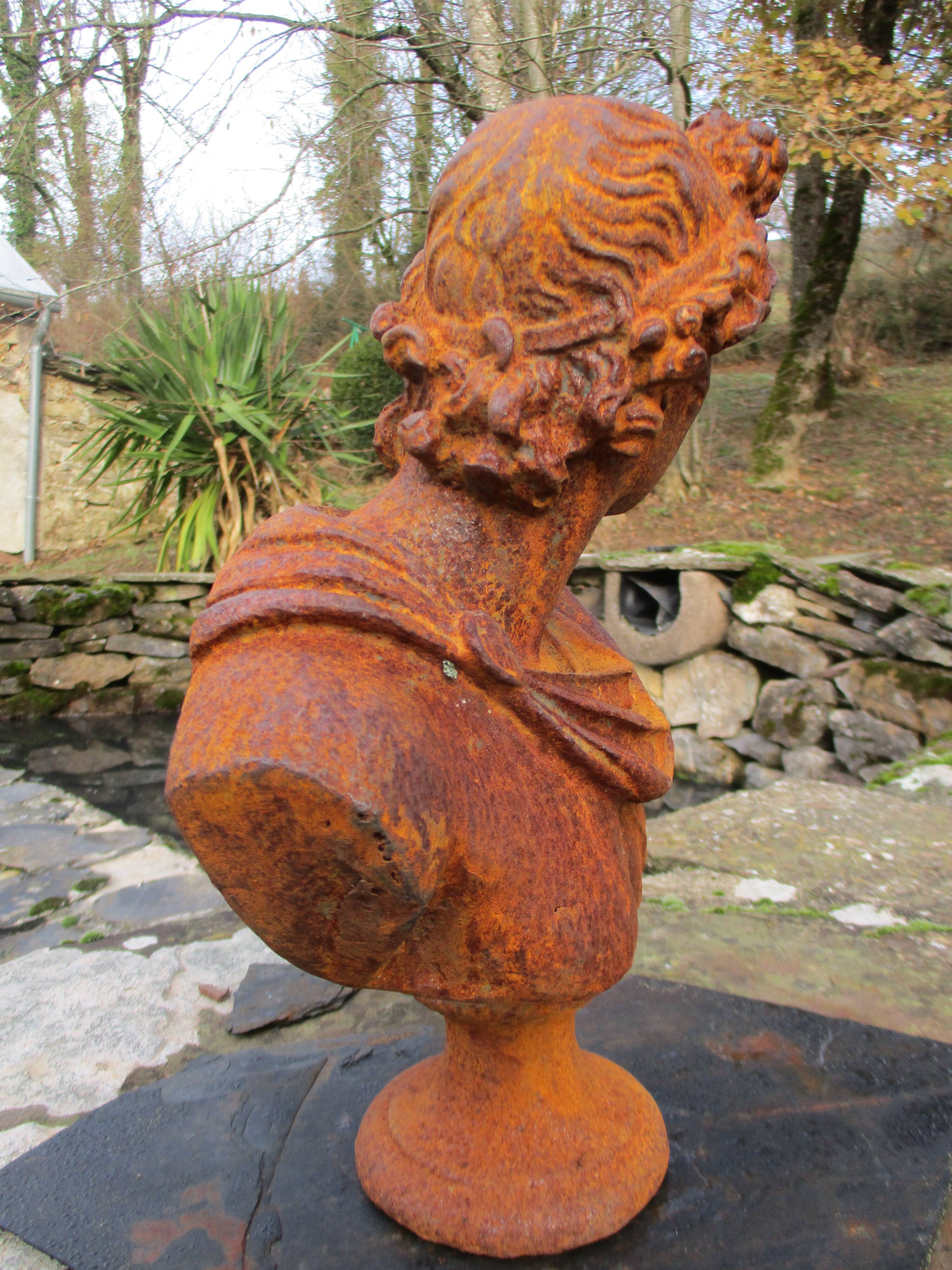 Cast iron bust of a 19th century roman woman