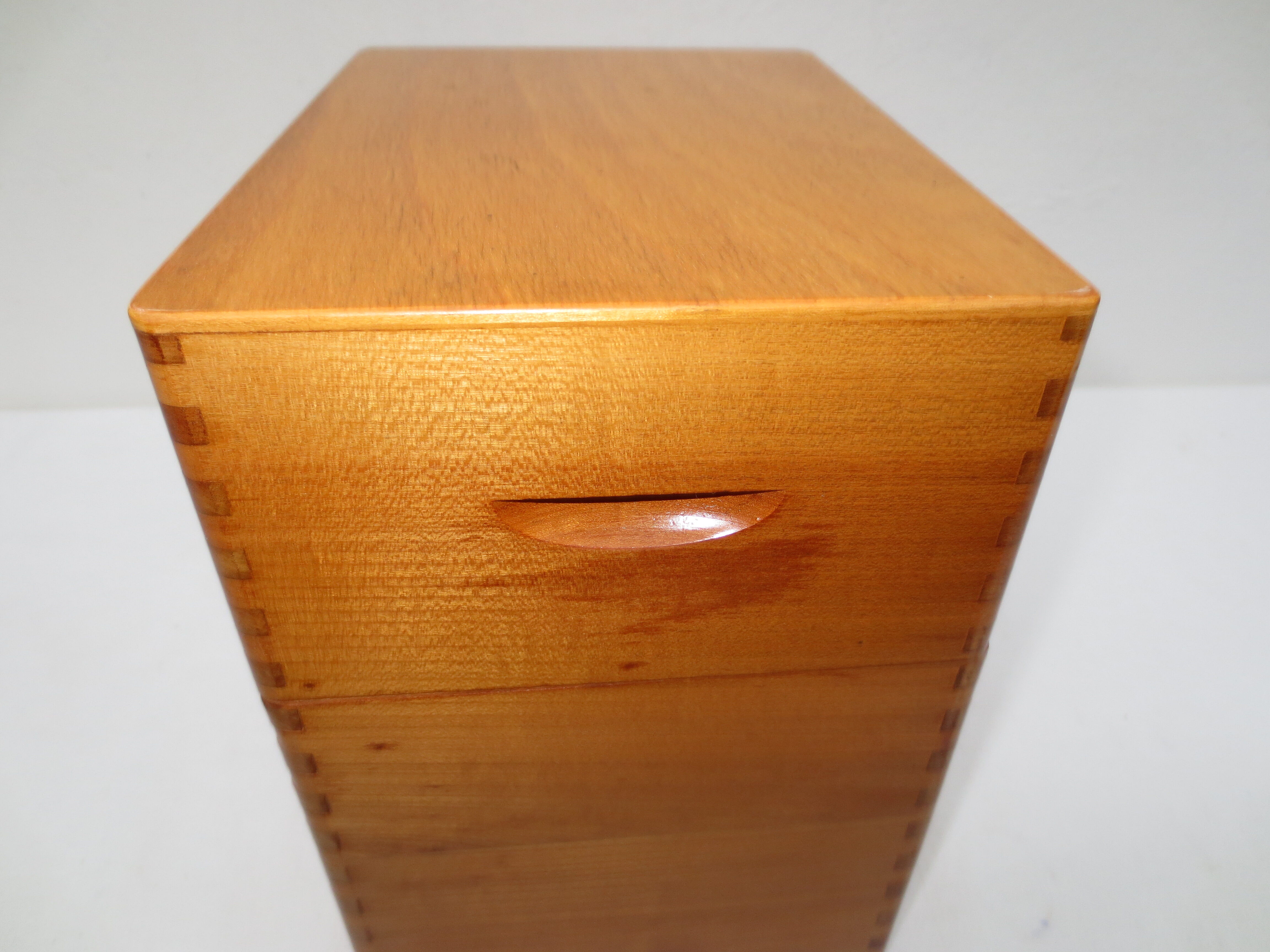 old mortised box in light varnished wood