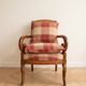 Classic armchair in wood and burgundy fabric