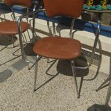 Set of 4 armchairs in chromed metal and brown imitation leather, circa 1960