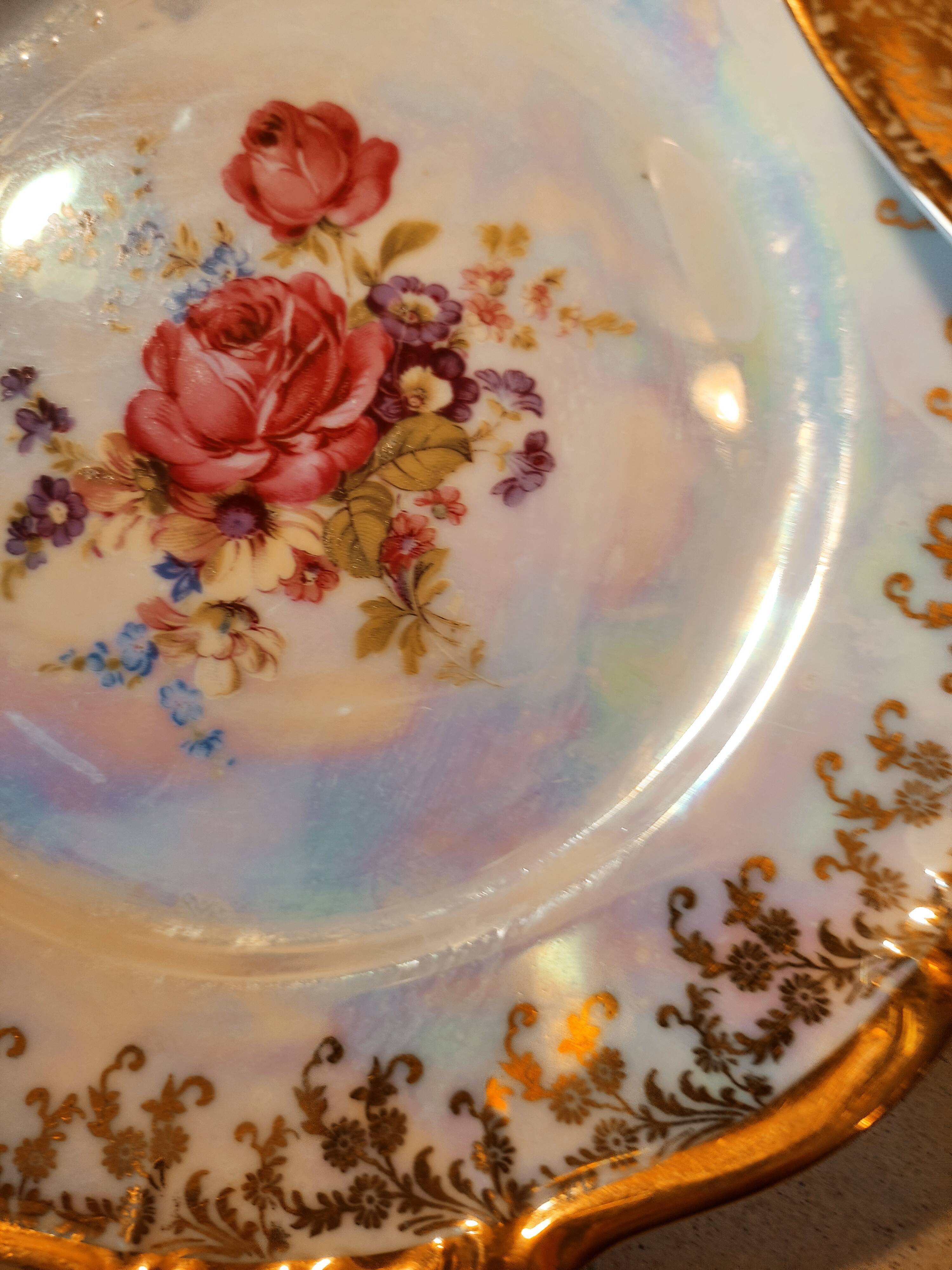6 mismatched dessert plates decorated with roses