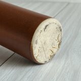 Decorative brown ceramic bottle.