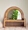 Woven rattan and wicker shelf mirror in the Emmanuelle style, Spain, 1970s.