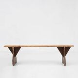 Rustic wooden bench in with brown painted feet, France ca. 1890