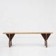 Rustic wooden bench in with brown painted feet, France ca. 1890