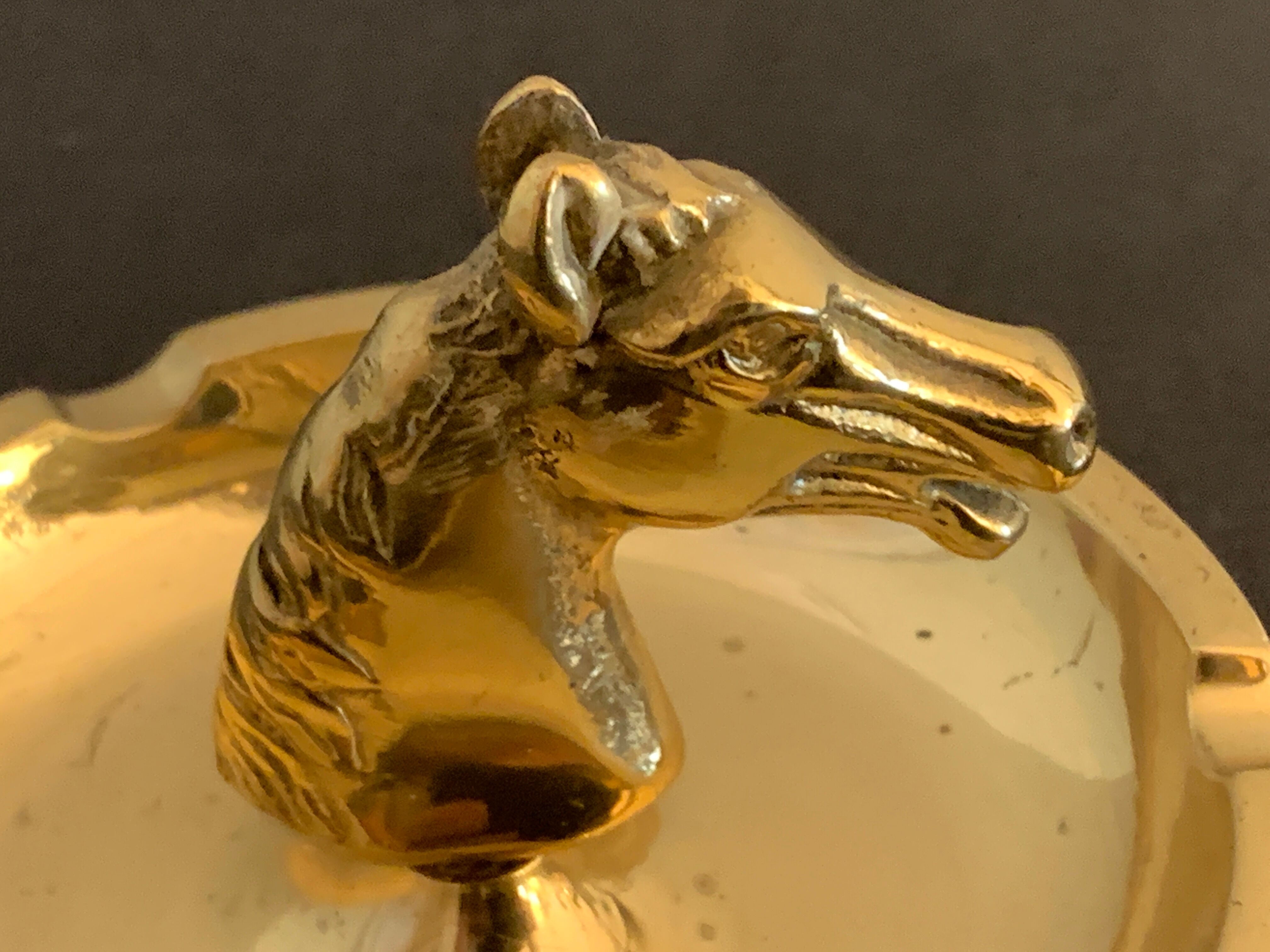 Horse-headed brass ashtray