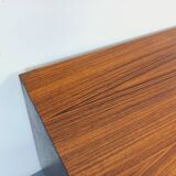 Vintage Scandinavian modernist chest of drawers in rosewood and black metal.