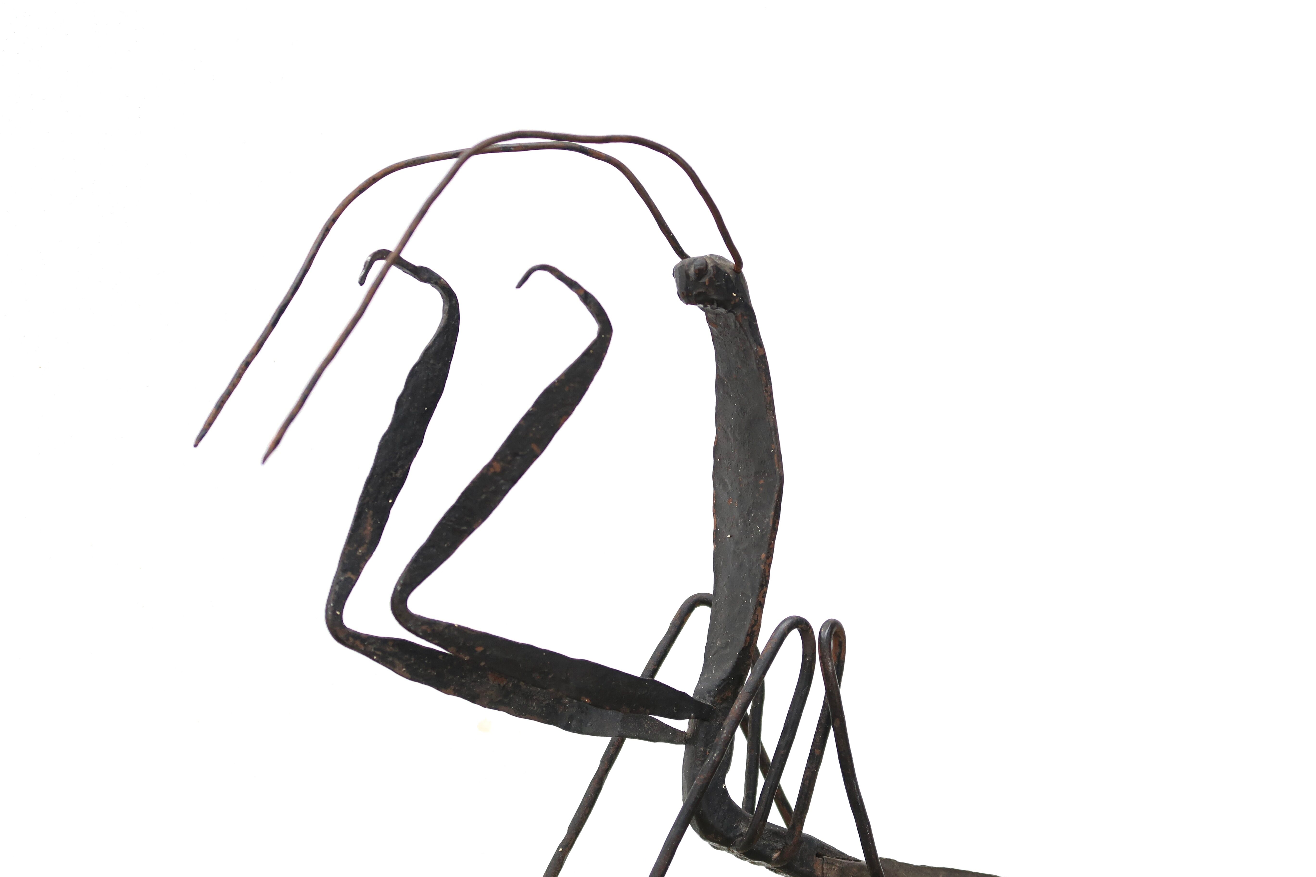 Sculpture of a religious mantis in wrought iron, 50s