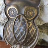 empty brass owl pocket