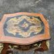 Louis XV style side table with marquetry and gilded bronze.
