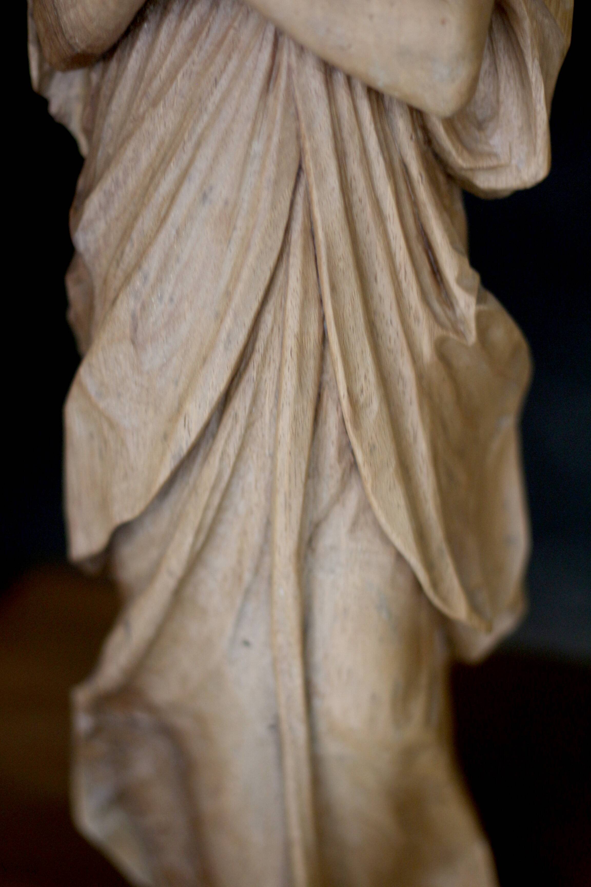 Sacred art: 19th century beechwood cherub statuette