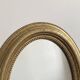 Antique oval gold mirror in Louis XVI style - beautiful patina.