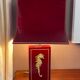 Pair of table lamps in Bordeaux lacquered wood and brass seahorse