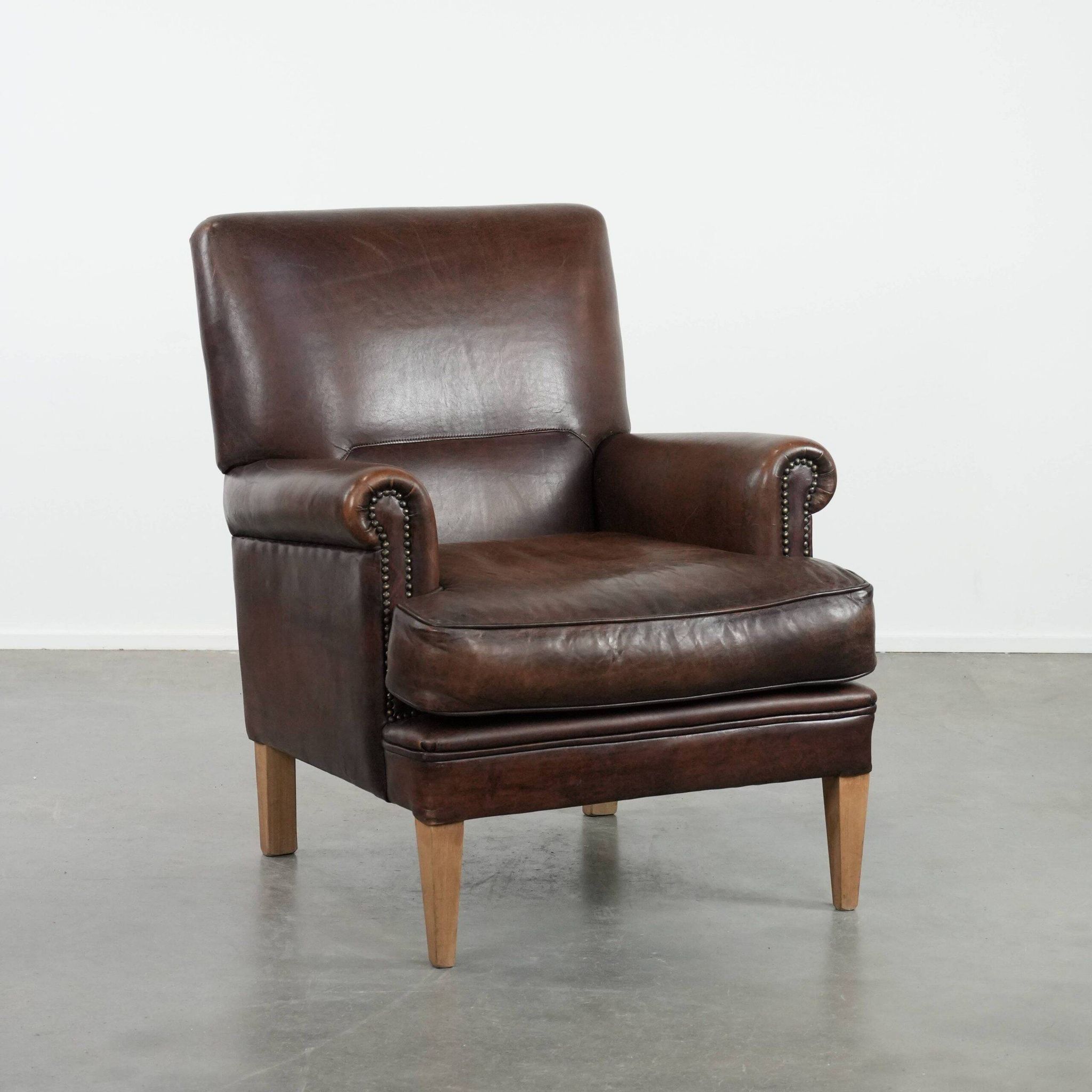 Beautiful Characterful Sheep Leather Armchair with a Deep Colour