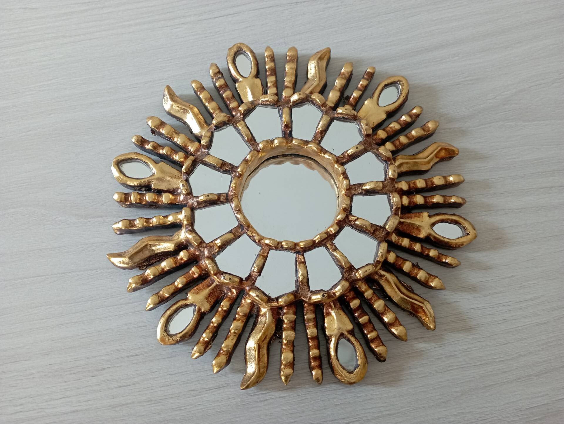 Golden wood sun mirror