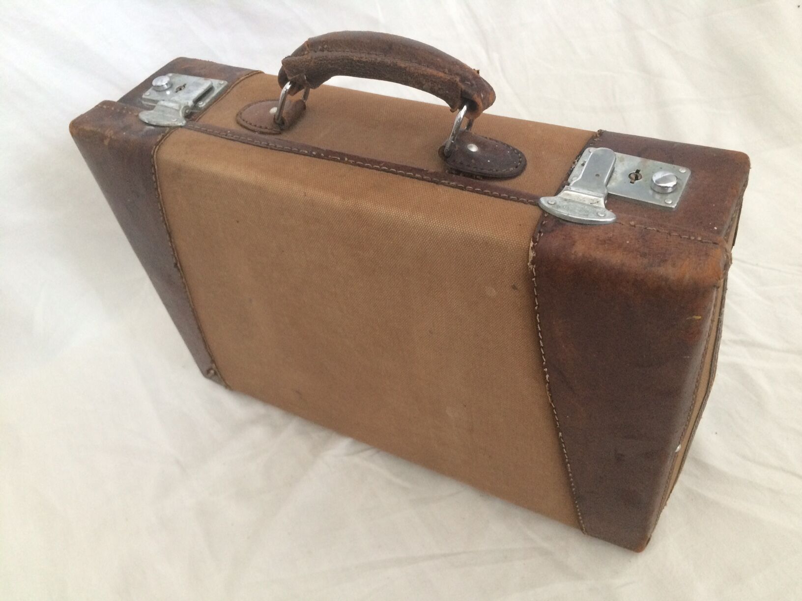 Cloth suitcase and leather vintage