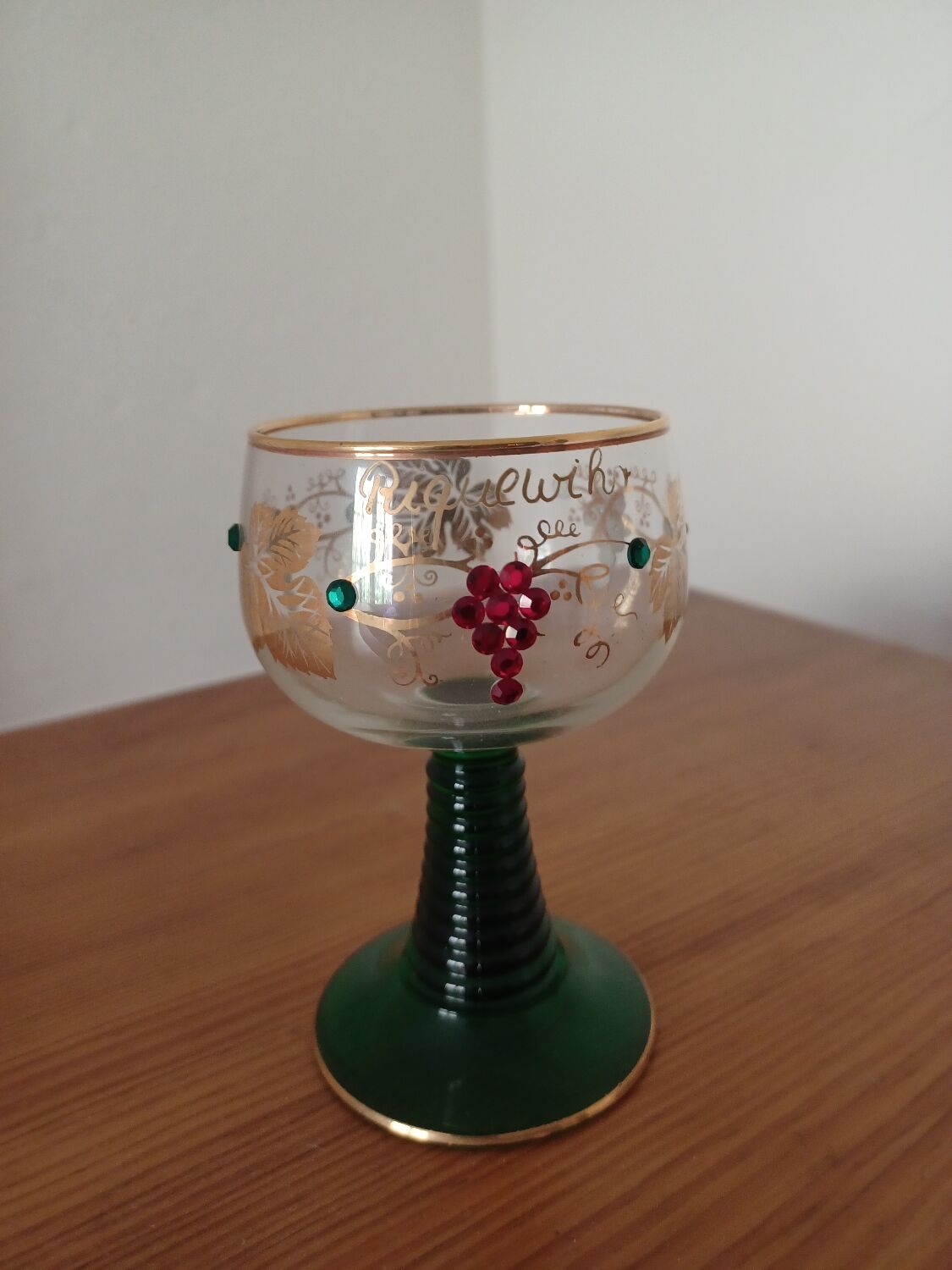 Stemmed glass decorated with vintage spirit