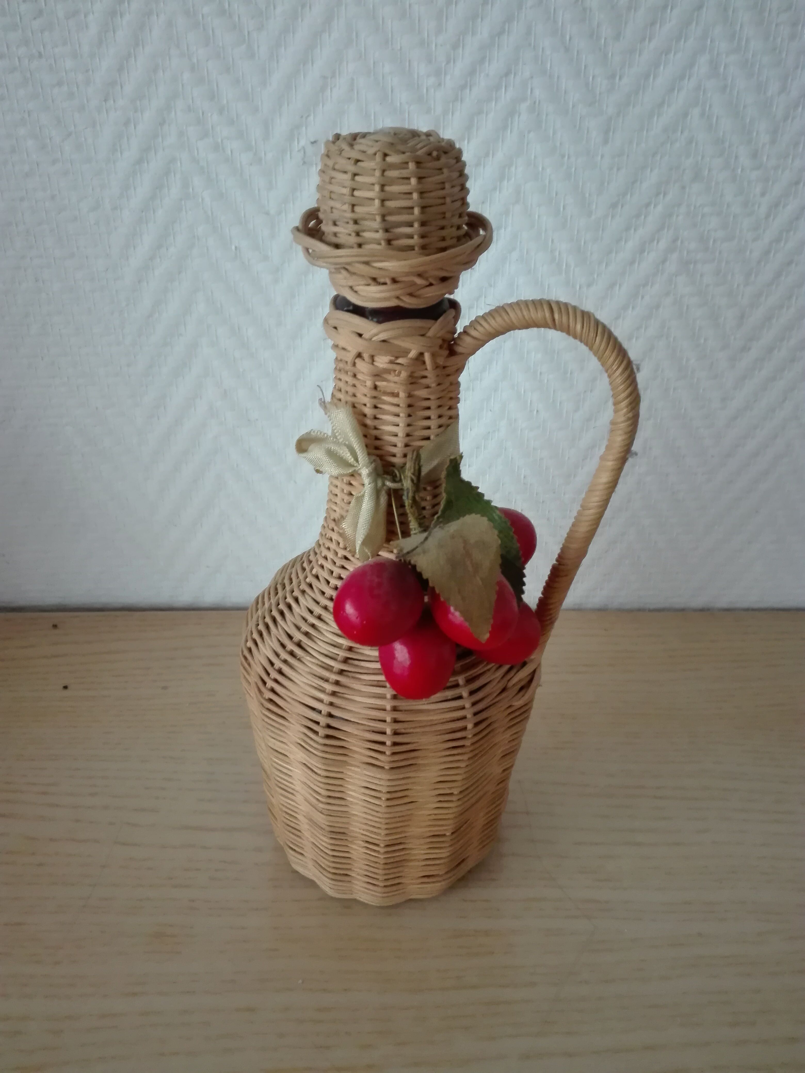 Vintage braided rattan bottle