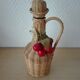 Vintage braided rattan bottle