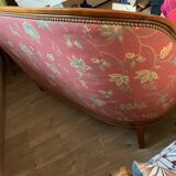 Art Deco style sofa, covered in Indian fabric with a pink background