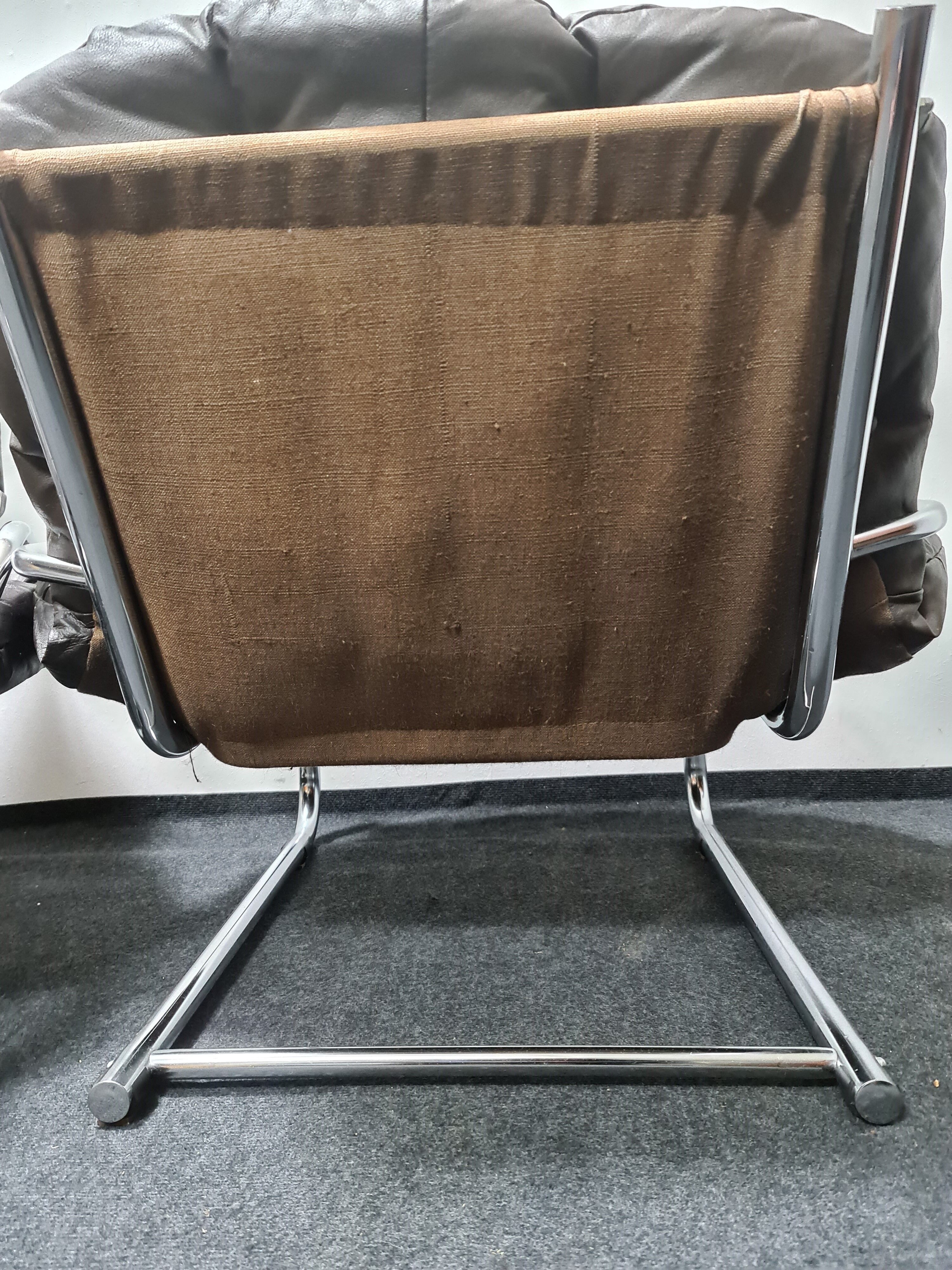 Pair of chrome and leather vintage chairs