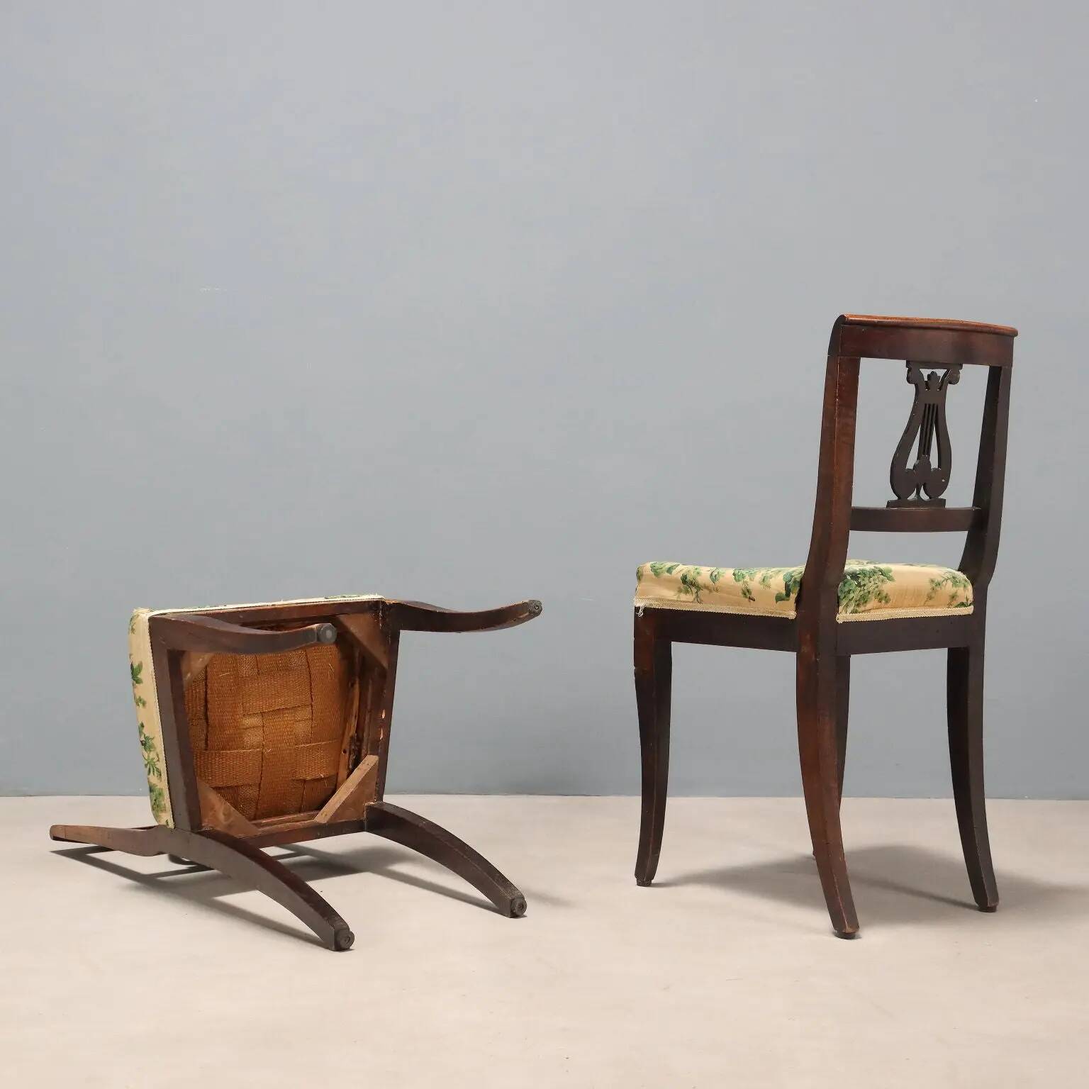 Pair of antique Directoire chairs in walnut and fabric, Italy, 19th century.
