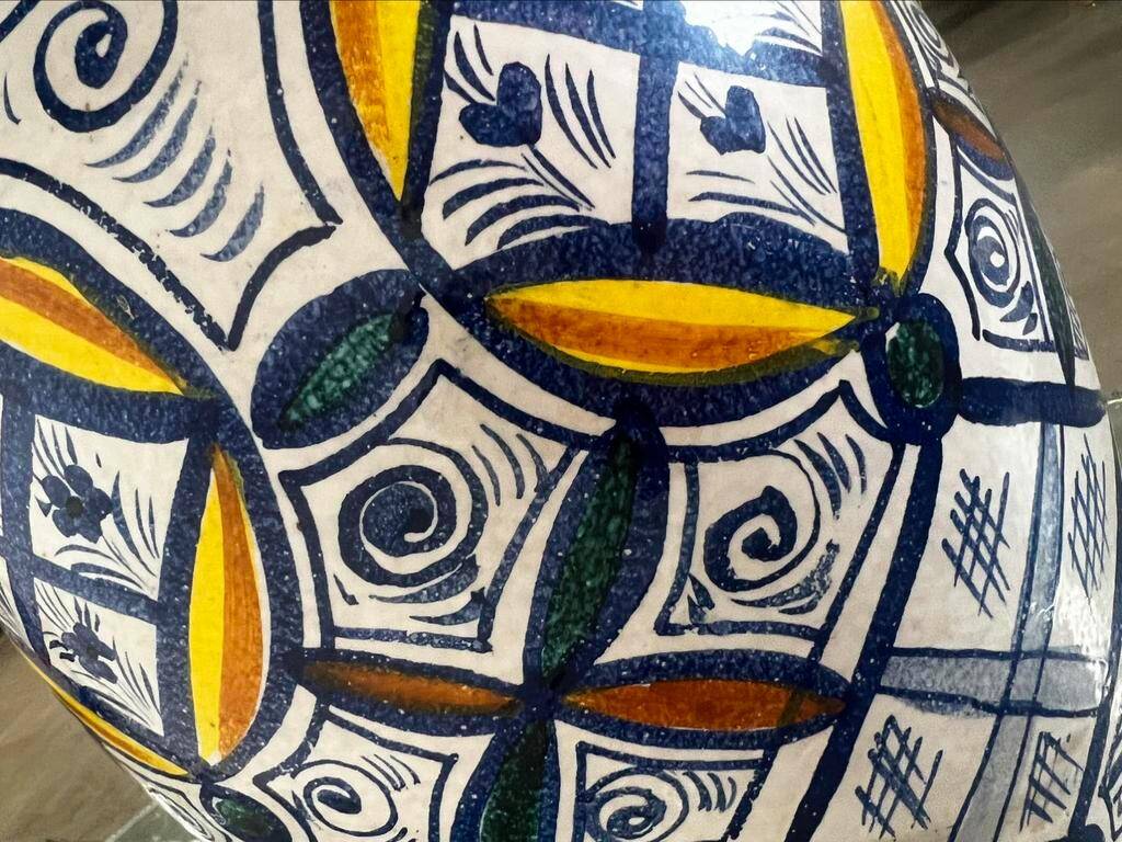 Vintage ceramic vase in ethnic style
