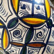 Vintage ceramic vase in ethnic style