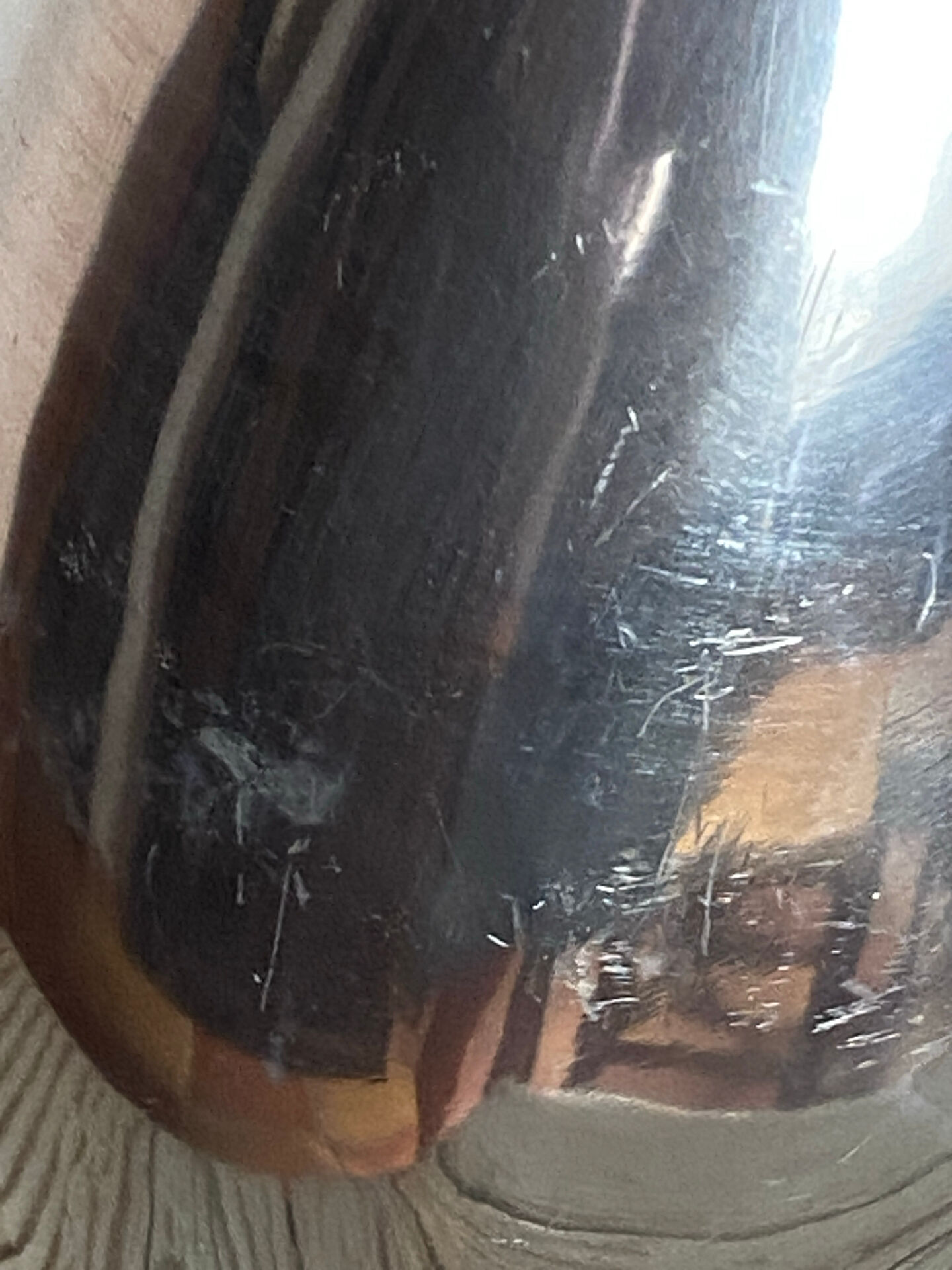 Large organic vase in polished aluminium cast.