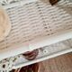 Vintage rattan and bamboo shelves painted white