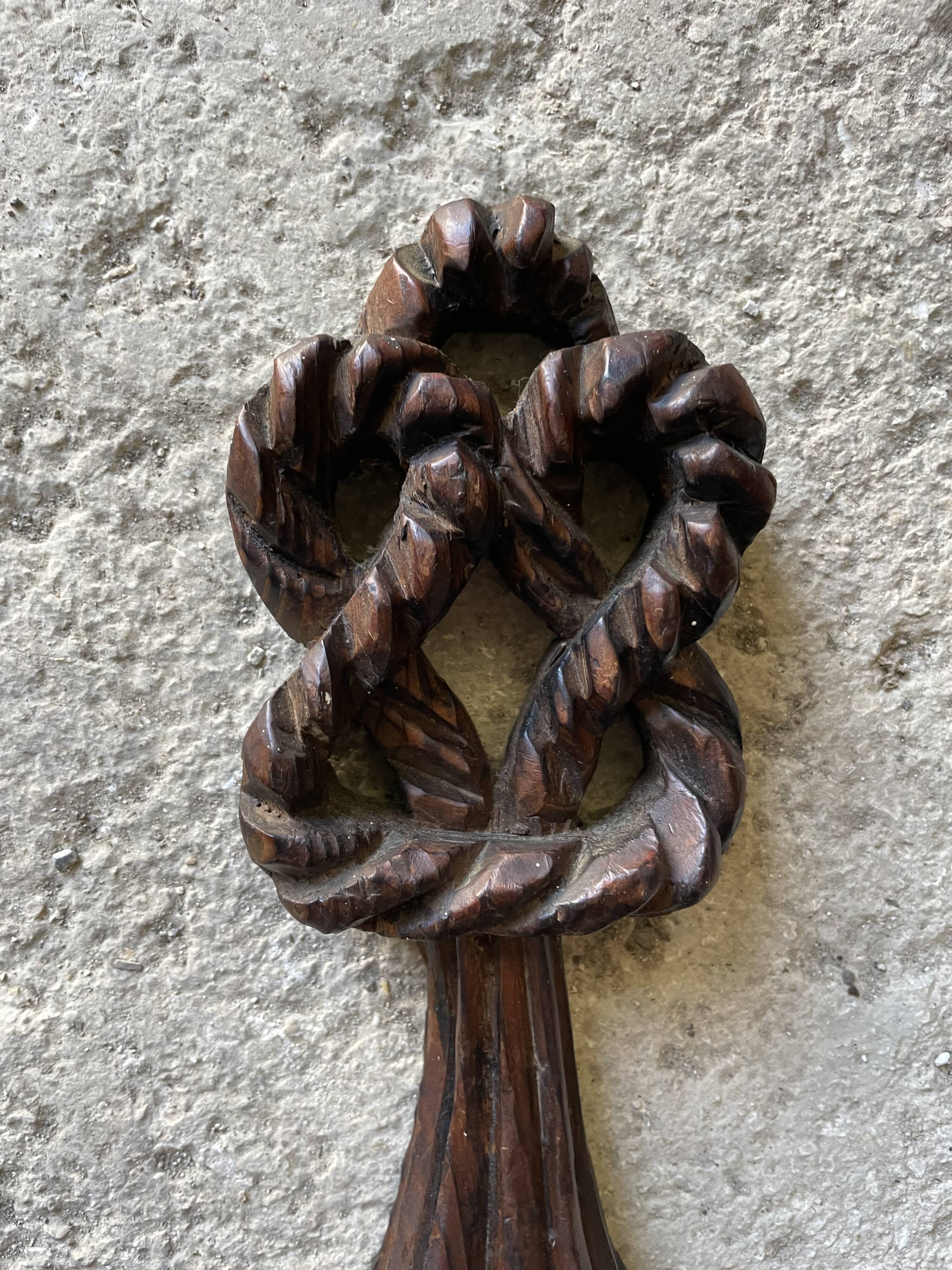 Carved wooden wall candle holder