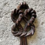 Carved wooden wall candle holder