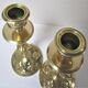 Pair of vintage brass candlesticks decorated with flowers
