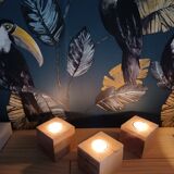Set of three wooden candlesticks