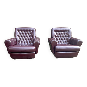 Pair of padded armchairs in aubergine leatherette