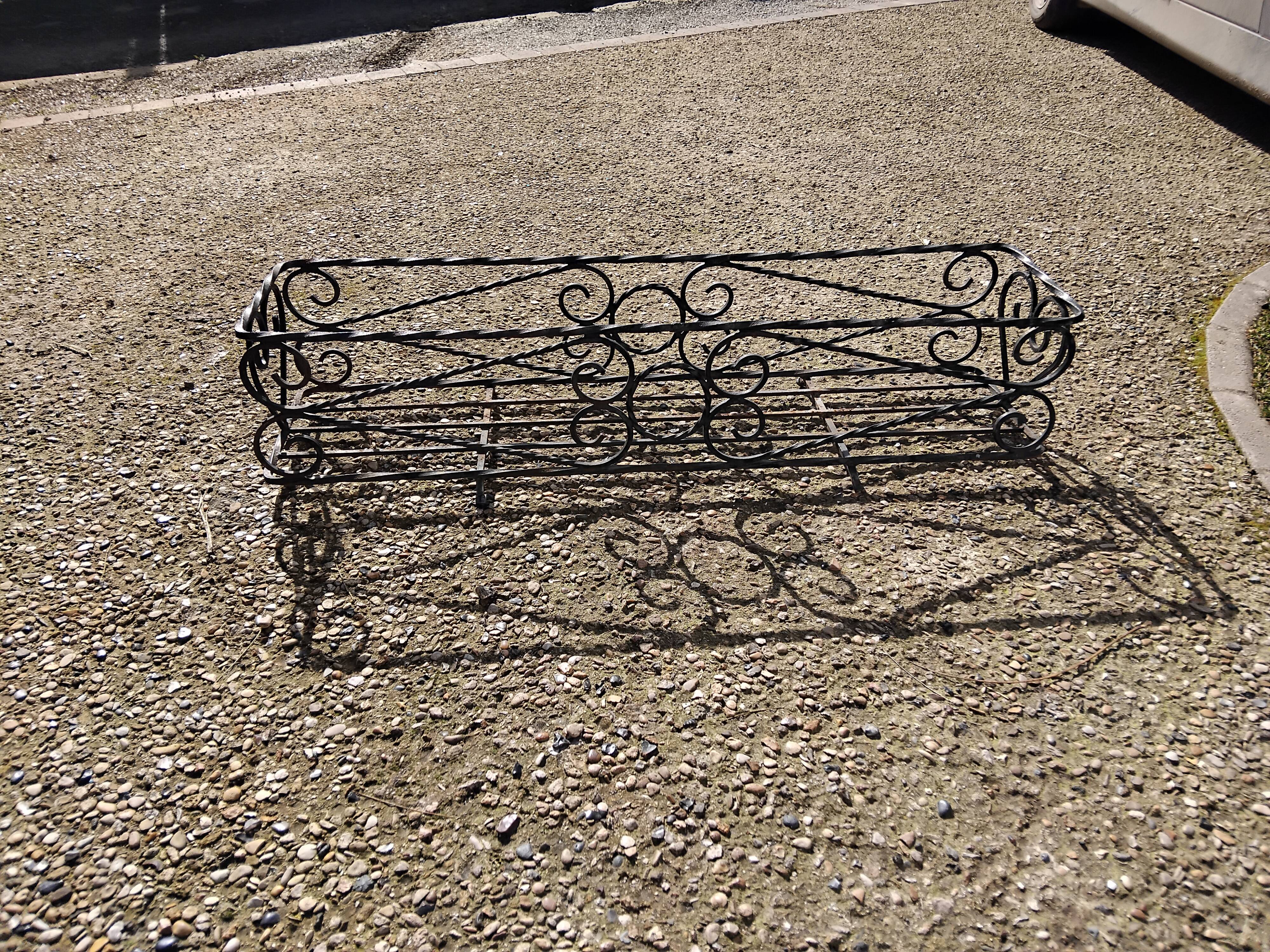 Antique wrought iron planter