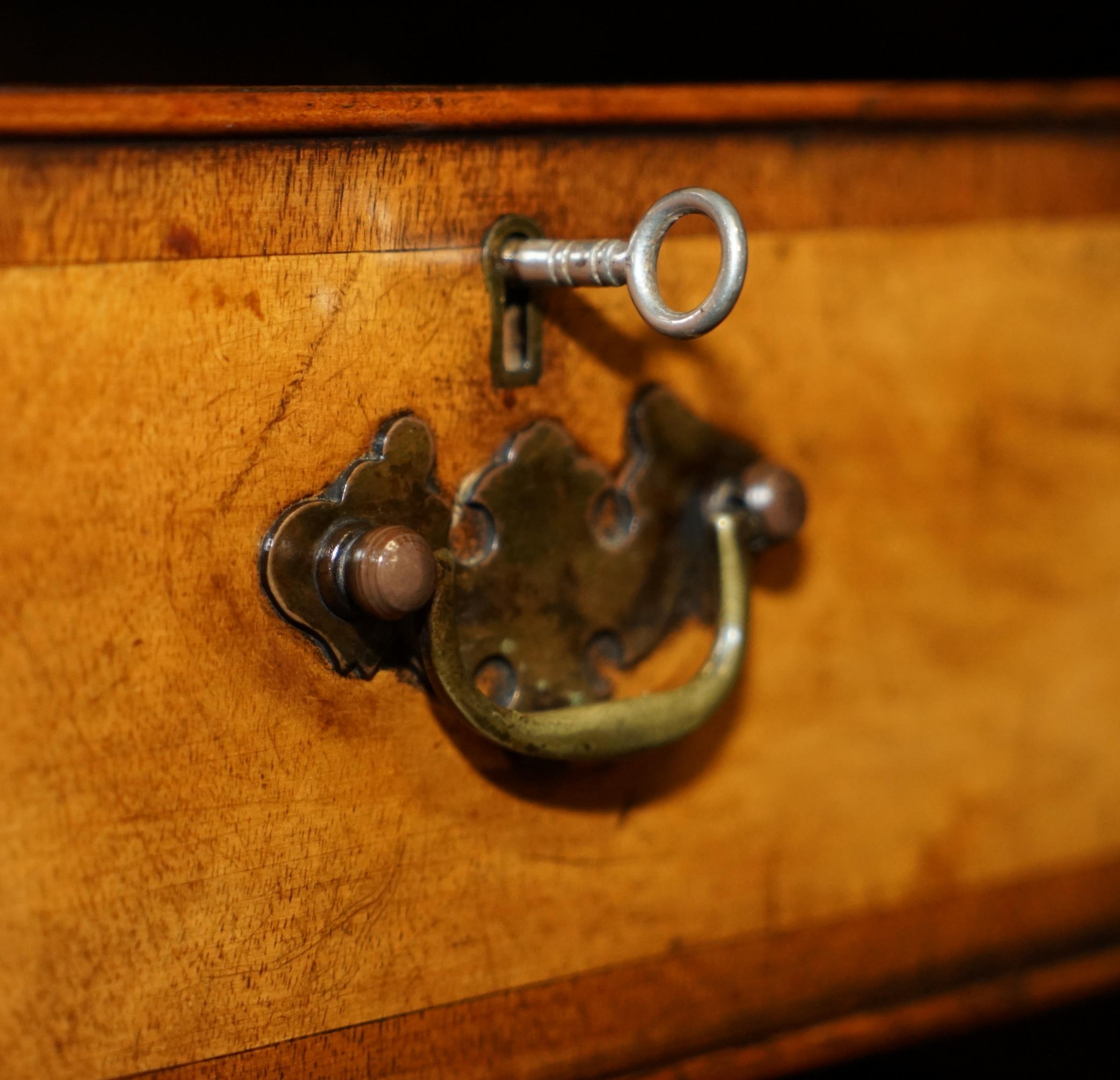 Victorian antique partner's desk in veined walnut with a leather top.