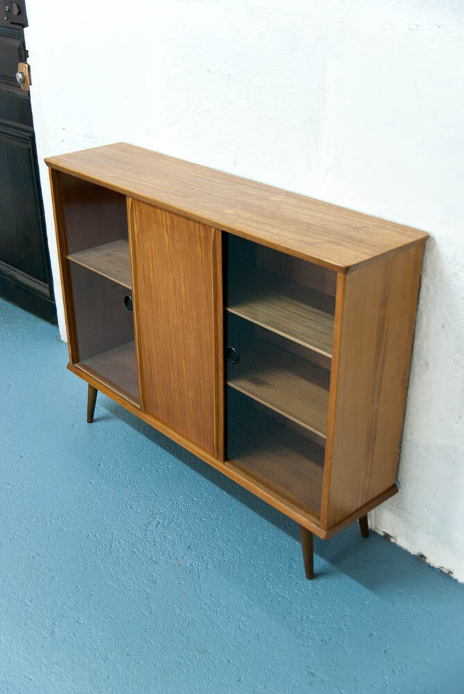 Console with sliding doors
