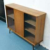 Console with sliding doors