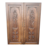 pair of antique solid oak cabinet doors with bird decor