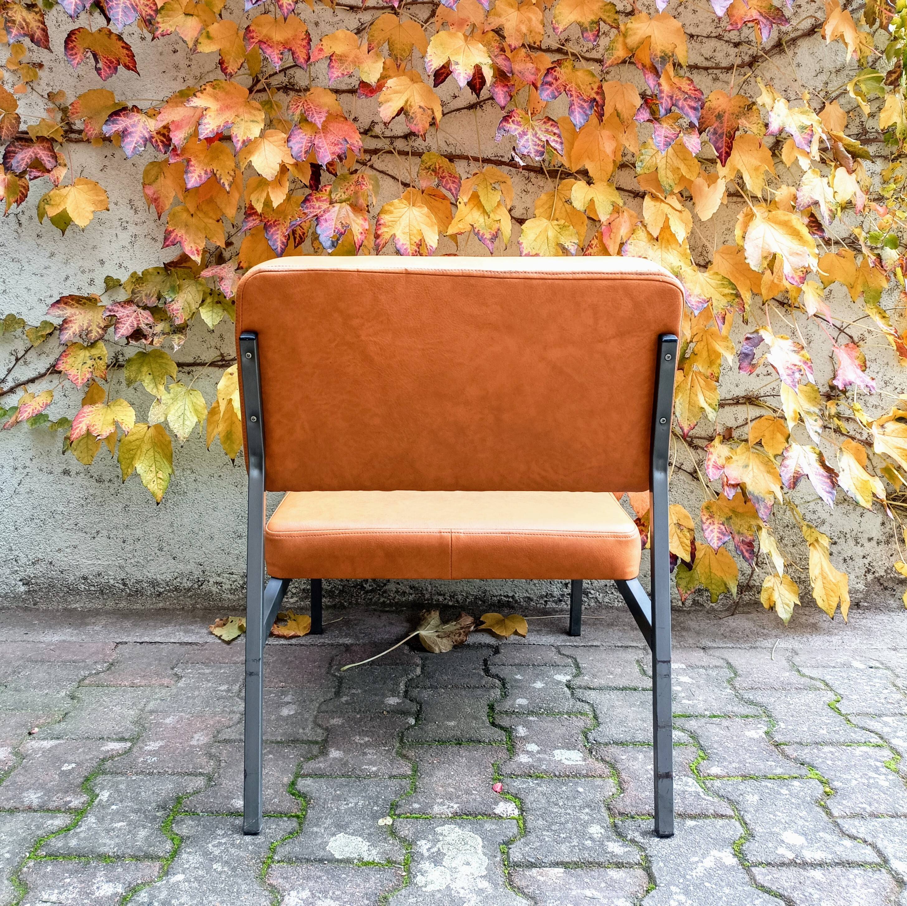 Modernist leatherette armchair